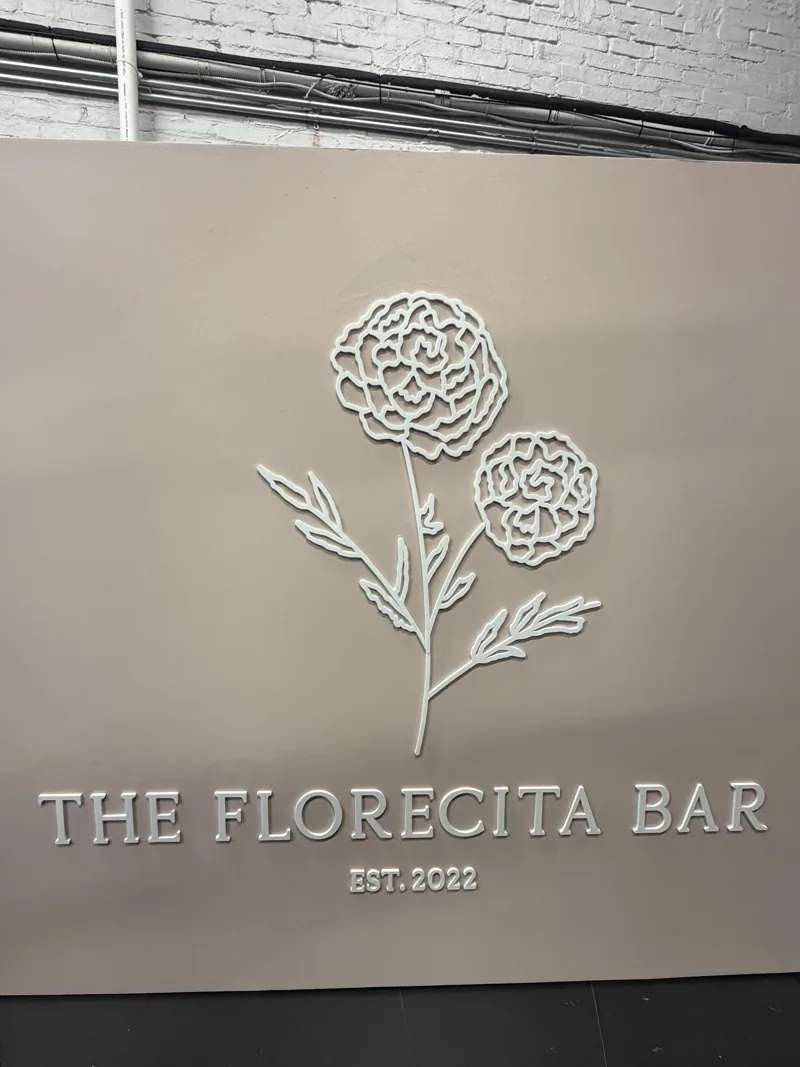 The Florecita Bar wall logo