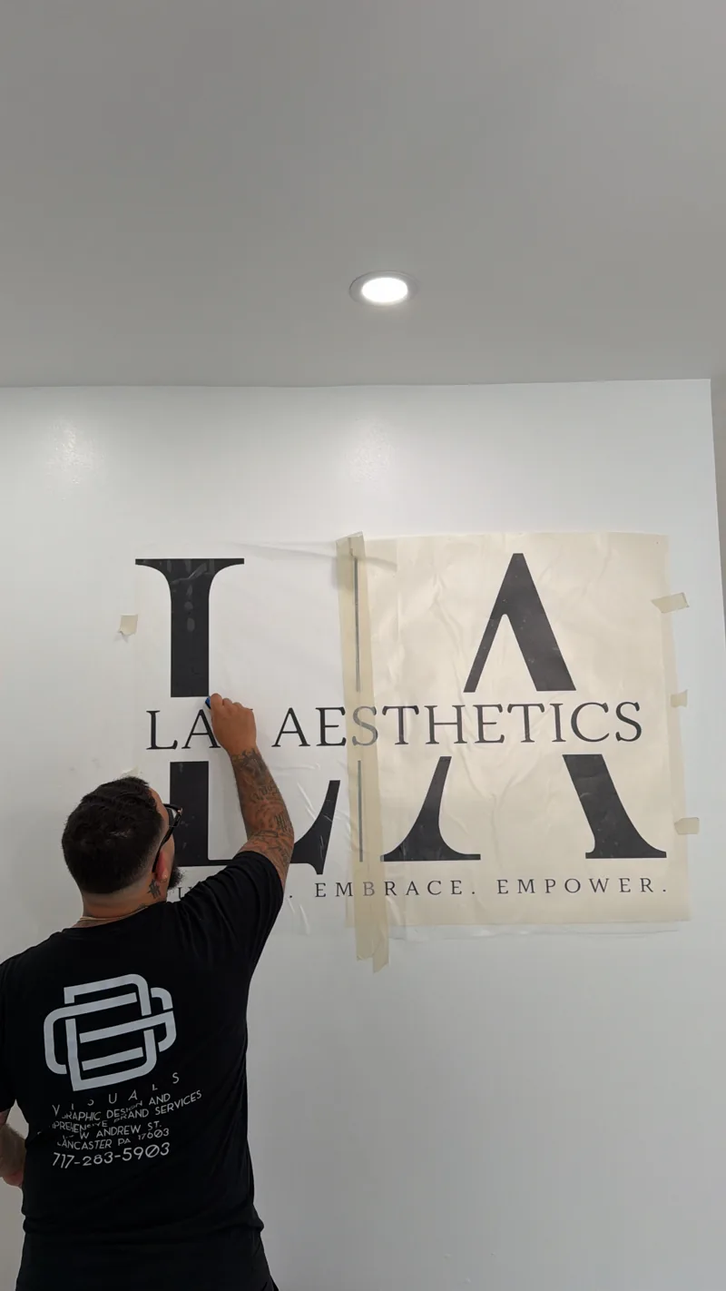 Installing the Lay Aesthetics wall logo