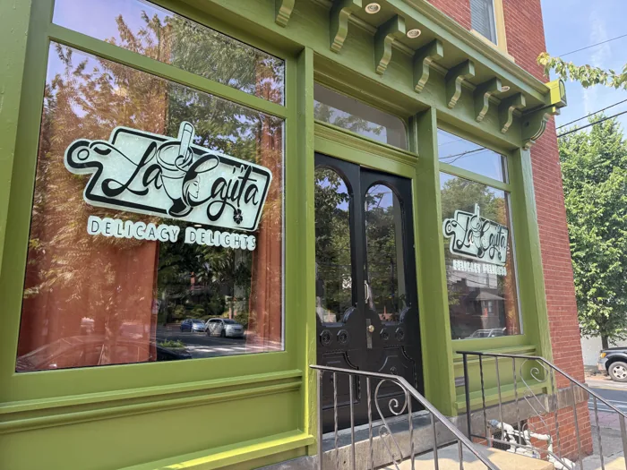 La Cajita storefront window graphics